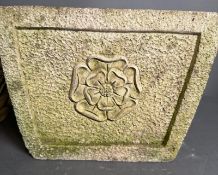 A pair of Cotswold Studios concrete plant pots with acorn and rose decorations