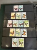 An album of mint World stamps on a butterflies theme to include Cuba, Papua New Guinea and Iran (