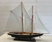 A model boat on plinth