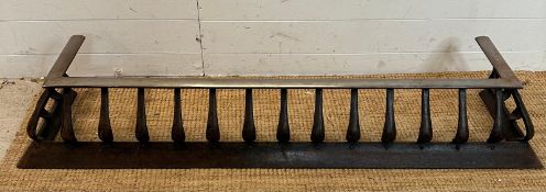 A cast iron and metal Art Nouveau fire fender 150cm x 36cm