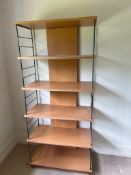 An open bookcase with metal sides (H178cm W81cm D40cm)
