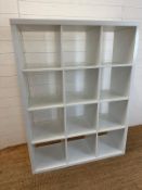 A white Ikea twelve compartment storage unit (H147cm W112cm D40cm)