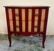 A French red and white striped painted chest of drawers consisting of two long drawers and