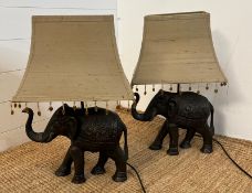 A pair of elephant lamps