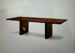 A contemporary hardwood plank dining table (W220cm D100cm H73cm)