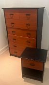 A bedroom set consisting of a chest of drawers with four long drawers and four short drawers and one