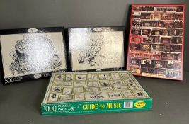 A selection of jigsaw, puzzles etc