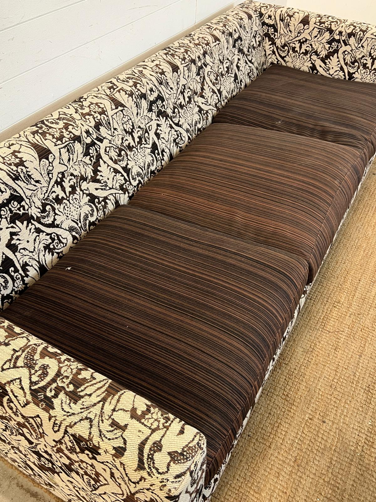 Three seater sofa with pattern fabric and brown cushion seat pads by MOOOI (H60cm W220cm D86cm - Image 2 of 4