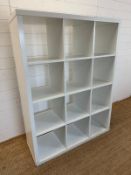 A white Ikea twelve compartment storage unit (H147cm W112cm D40cm)