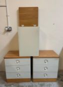 A pair of grey pine topped three drawer bedside tables by Stag and a matching laundry bin (H63cm