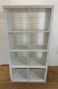 A white Ikea eight compartment storage unit (H147cm W77cm D39cm)