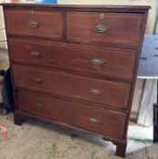 A mahogany two over three chest of drawers on bun feet and brass handles (H117cm W107cm D52cm)