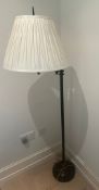 A floor standing lamp with an angled arm H156cm