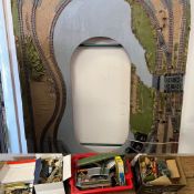 A model railway layout along with models and accessories 122cm x 215cm