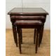 A nest of three glass top side tables with string inlay on fluted legs - Image 1 of 3