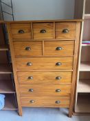 A multi drawer pine chest (H141cm W90cm D53cm)