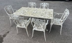 An aluminium garden table and six armchairs (H72cm W142cm D74cm)