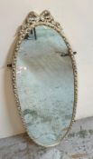 A French cheval style oval wall mirror in white and gold 128cm x 43cm