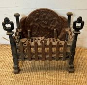 A cast iron fire grate (H42cm W43cm D25cm)