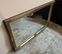 A wooden framed gold painted bevel edged over mantel mirror 140cm x 74cm