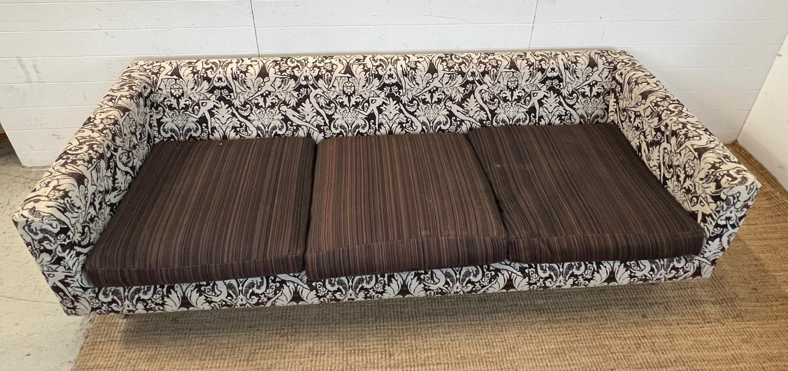 Three seater sofa with pattern fabric and brown cushion seat pads by MOOOI (H60cm W220cm D86cm - Image 3 of 4
