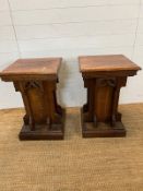A pair of gothic revival oak display pedestals