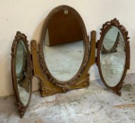 A Rococo style trifold mirror with scrolling floral detail (H67cm W102cm)