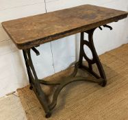 A cast metal industrial table (H78cm W90cm D52cm)