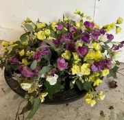 A low circular garden planter with artificial sweet pea flowers (H12cm Dia42cm)