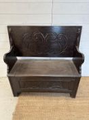 An oak carved monks bench
