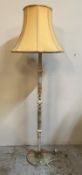 A green marble standard lamp with brass banding and detail to base (H170cm)