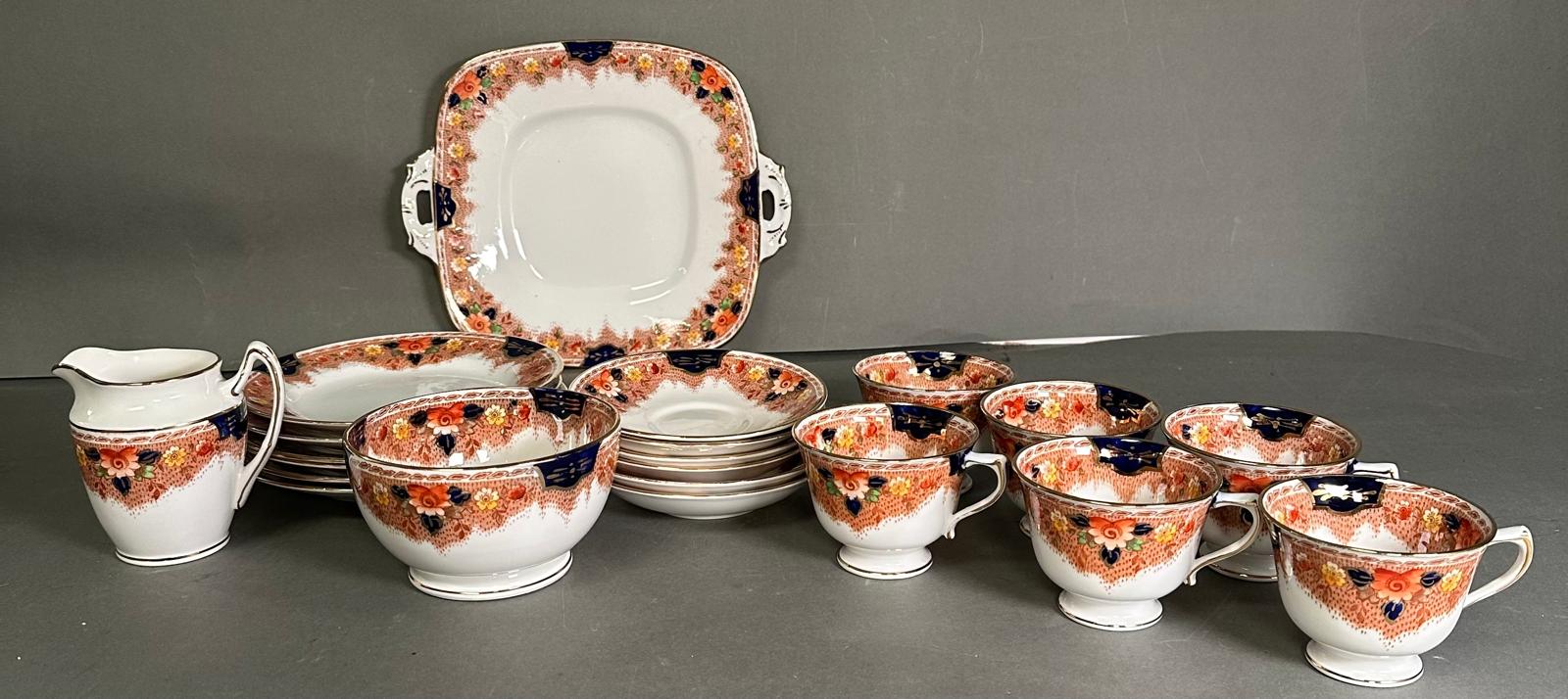 A part Royal Stafford tea service in a floral pattern with gilt detail