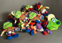 A quantity of Time Keepers of the Millennium cuddly toys