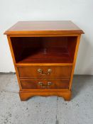 A reproduction bedside with faux drawers opening to cupboard (H67cm W48cm D34cm)