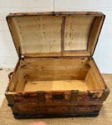 A vintage pine domed trunk. Banded and with black metal rivet fittings 84x46 height60