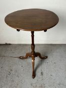 A pedestal table with tripod legs (H68cm W51cm)