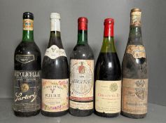 A selection of five bottles of wine to include: Christophe Rouge Vin De Table, 1969 Bergerac, 1992