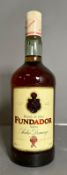 A bottle of Pedro Domecq Grandy De Jerez Fundador