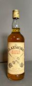 A bottle of The Claymore Scotch Whisky 40% vol