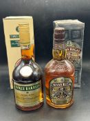 A bottle of three Barrels Brandy and a bottle of Chivas Regal whisky, both boxed