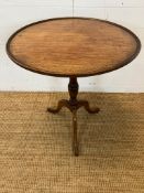 An oak tripod occasional table (H70cm Dia60cm)