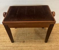 A adjustable piano stool