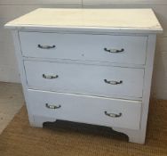 A painted pine chest of drawers (H84cm W90cm D48cm)