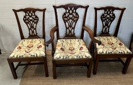 A set of three oak dining chairs