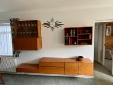 A Mid Century metamorphic six piece wall hanging furniture set