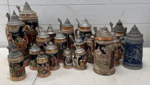 A selection of German lidded beer mugs, various sizes