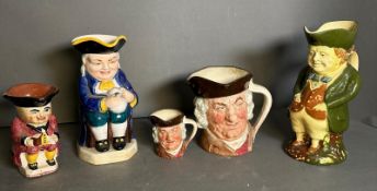 A selection of Toby style mugs and jugs, various makers to include Beswick and Royal Doulton (some