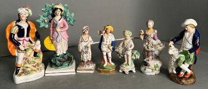 A selection of seven figurines, to include Chelsea and Staffordshire in varying conditions and