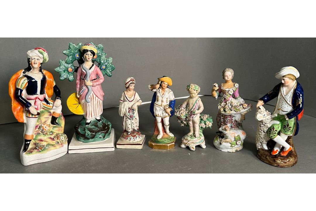 A selection of seven figurines, to include Chelsea and Staffordshire in varying conditions and - Image 1 of 5