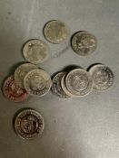 A selection of eleven 1990 World Cup commemorative tokens.